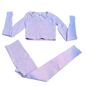 Small, two piece Sawikofit, leggings and fitted long sleeve crop top